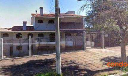 Belíssima casa com 5 dormitórios no bairro Tristeza