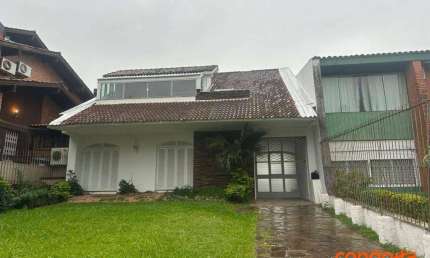 Casa com 3 dormitórios para alugar, 594 m² por R$ 11.432/mês - Cristal - Porto Alegre/RS