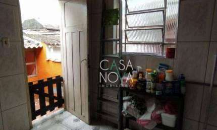 Sobrado com 3 dormitórios à venda, 124 m² por R$ 480.000,00 - Macuco - Santos/SP