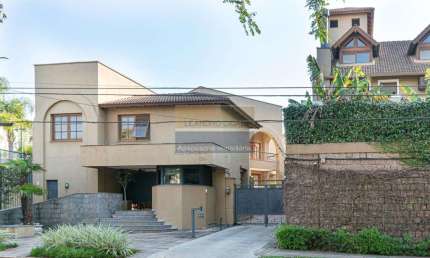 Casa de condomínio 3 dormitórios à venda no Bairro Três Figueiras com 435 m² de área privativa - 3 vagas de garagem