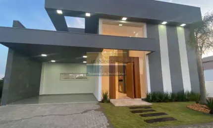 Casa de condomínio 3 dormitórios à venda no Bairro Centro com 190 m² de área privativa - 4 vagas de garagem