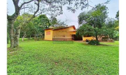 Casa 3 dormitórios à venda no Bairro Tarumã com 160 m² de área privativa - 2 vagas de garagem