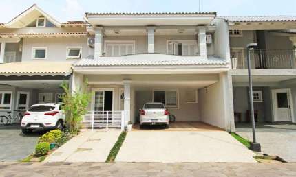 Casa de condomínio 3 dormitórios à venda no Bairro Sarandi com 192 m² de área privativa - 5 vagas de garagem