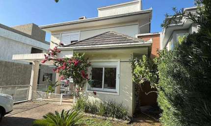 Casa de condomínio 3 dormitórios à venda no Bairro Condomínio Buena Vista com 198 m² de área privativa - 2 vagas de garagem