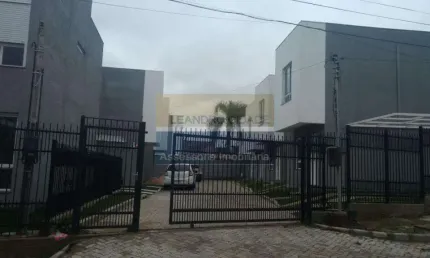Casa de condomínio 2 dormitórios à venda no Bairro Tarumã com 77 m² de área privativa - 2 vagas de garagem