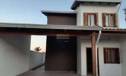 Casa de condomínio 3 dormitórios à venda no Bairro Centro com 145 m² de área privativa - 2 vagas de garagem