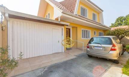 Sobrado com 4 dormitórios à venda, 183 m² por R$ 850.000,00 - Cajuru - Curitiba/PR