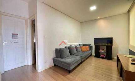 Sobrado com 4 dormitórios à venda, 210 m² por R$ 1.500.000,00 - Gonzaga - Santos/SP