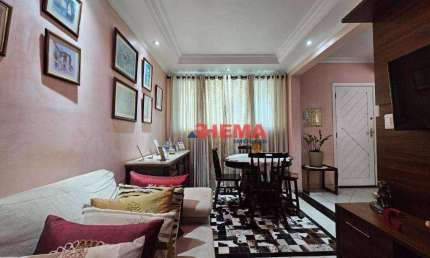 Sobrado com 3 dormitórios à venda, 100 m² por R$ 610.000,00 - Macuco - Santos/SP