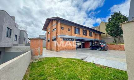 Casa com 5 quartos à venda na Antônio Sim, 675, Tarumã, Curitiba por R$ 1.740.000