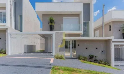 Sobrado com 3 suítes com 10 metros de frente no bairro Cancelli