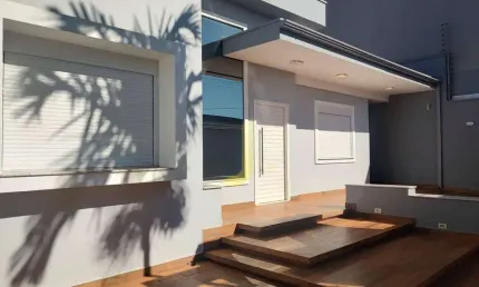 Casa com edícula e piscina e passagem lateral no tropical 3