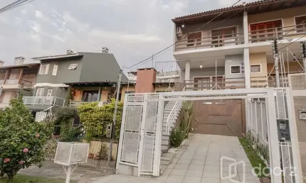 Casa com 3 quartos à venda na Avenida Doutor Francisco Roberto Dall Igna, 308, Espírito Santo, Porto Alegre, 187 m2 por R$ 619.000
