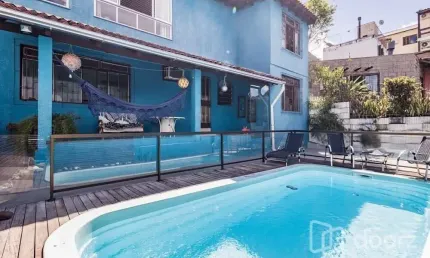 Casa com 4 quartos à venda na eleuthério de araújo, 88, partenon, porto alegre, 216 m2 por r$ 749.900