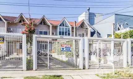 Casa com 2 quartos à venda na Rua Heitor Kramer, 324, Guarujá, Porto Alegre, 78 m2 por R$ 430.000