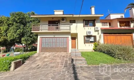 Casa em condomínio fechado com 3 quartos à venda na Praça São Caetano, 90, Teresópolis, Porto Alegre, 172 m2 por R$ 1.280.000
