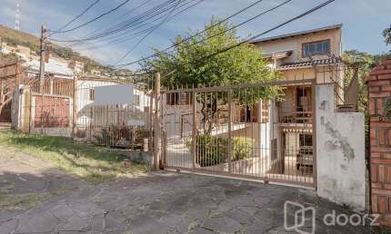 Casa com 5 quartos à venda na Rua Patrimonio, 119, Glória, Porto Alegre, 178 m2 por R$ 731.000