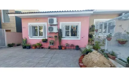 Casa em condomínio fechado com 2 quartos à venda na Rua Chácara das Nascentes, 285, Lomba do Pinheiro, Porto Alegre, 80 m2 por R$ 440.000