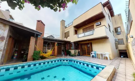 Casa com 4 quartos à venda na Rua Pinto da Rocha, 383, Partenon, Porto Alegre, 420 m2 por R$ 890.000