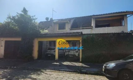 Sobrado com 4 dormitórios à venda, 211 m² por R$ 820.000,00 - Aviação - Praia Grande/SP