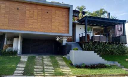 Casa em condomínio fechado com 3 quartos à venda na DAS FLORES, 19, Morrinhos, Garopaba, 388 m2 por R$ 2.900.000