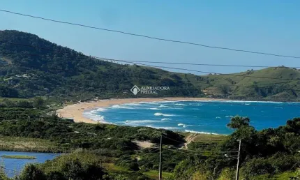Terreno à venda na municipal grp - 110, 190, praia da silveira, garopaba, 1550 m2 por r$ 1.590.000