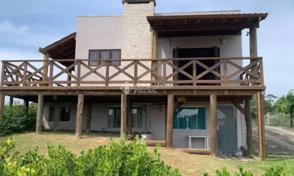 Casa com 5 quartos à venda na Porto Novo, 765, Praia do Rosa, Imbituba, 144 m2 por R$ 695.000