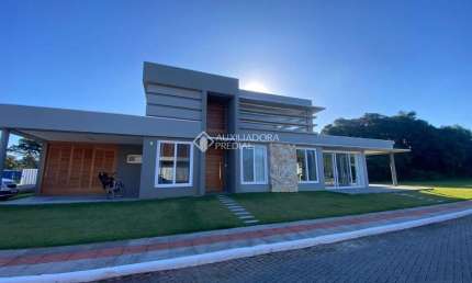 Casa em condomínio fechado com 3 quartos à venda na Dos Camarões, 588, Praia da Ferrugem, Garopaba, 220 m2 por R$ 3.510.000