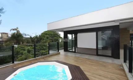 Casa em condomínio fechado com 4 quartos à venda na PALMEIRAS, 1009, Morrinhos, Garopaba, 390 m2 por R$ 4.247.730