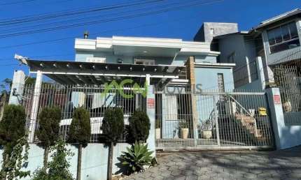 Casa com  3 dormitórios, piscina, móveis sob medida, no Sol Nascente, em Estância Velha.