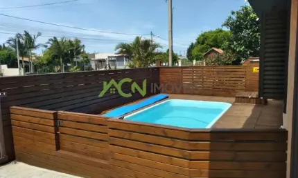 casa com dois dormitórios sendo um suite em Nova Tramandai!!!!