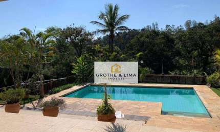 Casa com 3 dormitórios à venda, 300 m² por R$ 2.000.000,00 - Condomínio Lagoinha - Jacareí/SP