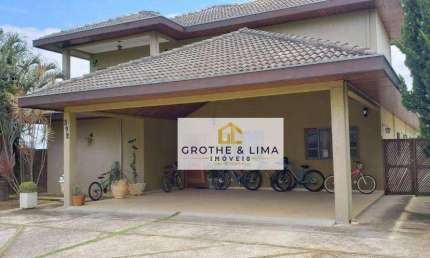 Casa com 4 dormitórios e 10 vagas à venda, piscina e 400 m² de construção por R$ 2.400.000 - Condomínio Residencial Mirante do Vale - Jacareí/SP