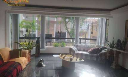 Casa com 3 dormitórios à venda por R$ 1.500.000,00 - Gonzaga - Santos/SP