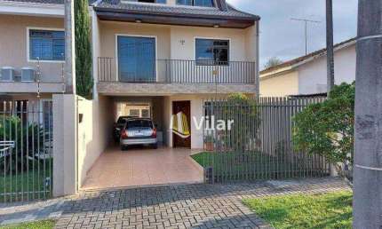 Sobrado com 4 dormitórios à venda, 220 m² por R$ 999.000 - Uberaba - Curitiba/PR