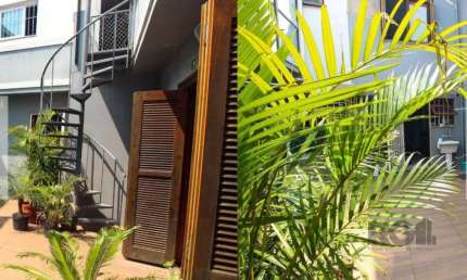 Casa com 4 quartos à venda na Rua Doutor Lossio, Jardim Botânico, Porto Alegre, 200 m2 por R$ 1.500.000