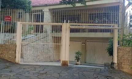 Casa com 3 quartos à venda na Rua Fagundes Varela, Santo Antônio, Porto Alegre, 420 m2 por R$ 1.250.000
