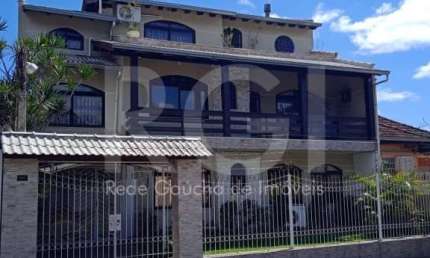 Casa com 6 quartos à venda na Rua Paissandu, Partenon, Porto Alegre