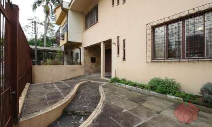 Casa com 3 quartos à venda na Rua Atanásio Belmonte, Boa Vista, Porto Alegre, 293 m2 por R$ 1.500.000