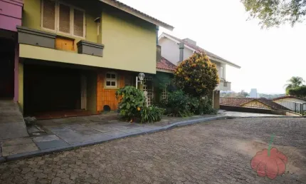 Casa em condomínio fechado com 3 quartos à venda na Rua Padre João Batista Reus, Vila Conceição, Porto Alegre, 201 m2 por R$ 775.000