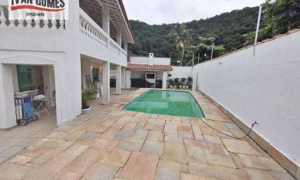 Sobrado com 4 dormitórios à venda, 272 m² por R$ 1.400.000,00 - Guaiuba - Guarujá/SP