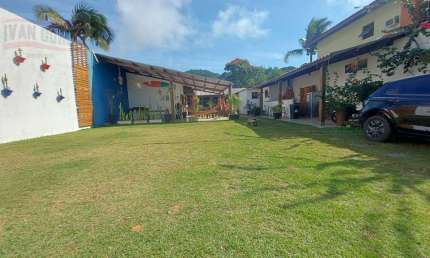 Casa com 6 dormitórios à venda, 300 m² por R$ 1.200.000 - Guaiuba - Guarujá/SP
