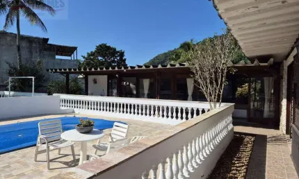 Casa com 4 dormitórios à venda, 485 m² por R$ 2.500.000 - Guaiuba - Guarujá/SP