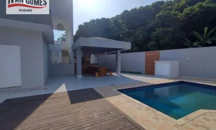 Sobrado com 3 dormitórios à venda, 135 m² por R$ 1.200.000,00 - Tombo - Guarujá/SP