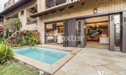 Casa em condomínio fechado com 3 quartos à venda na Rua Carlos Júlio Becker, 295, Tristeza, Porto Alegre, 421 m2 por R$ 2.240.000