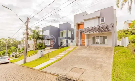 Casa em condomínio fechado com 3 quartos à venda na Avenida Senador Salgado Filho, 8500, Jardim Krahe, Viamão, 197 m2 por R$ 1.390.000