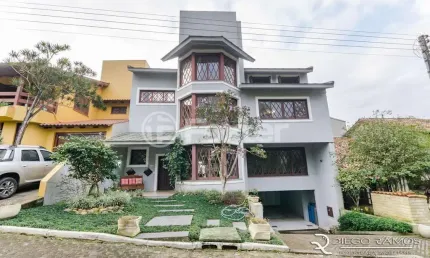 Casa em condomínio fechado com 3 quartos à venda na Rua Tocantins, 869, Lomba do Pinheiro, Porto Alegre, 385 m2 por R$ 1.700.000