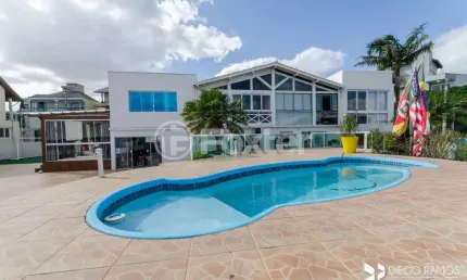 Casa em condomínio fechado com 5 quartos à venda na Rua Alcebíades Antônio dos Santos, 356, Nonoai, Porto Alegre, 627 m2 por R$ 2.536.500