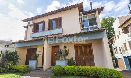 Casa em condomínio fechado com 3 quartos à venda na Rua Doutor Mário Totta, 416, Tristeza, Porto Alegre, 170 m2 por R$ 630.000