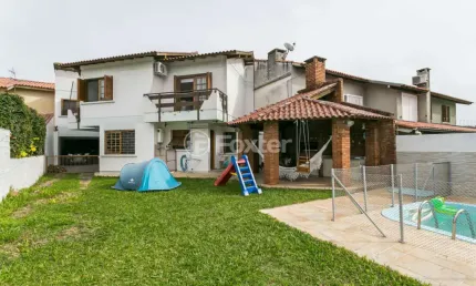Casa com 5 quartos à venda na Rua Fortunato Della Casa, 35, Espírito Santo, Porto Alegre, 243 m2 por R$ 1.520.000